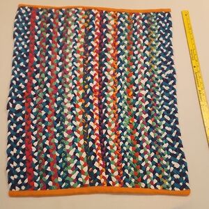 Handwoven Multicolor Braided Rug with Orange Trim